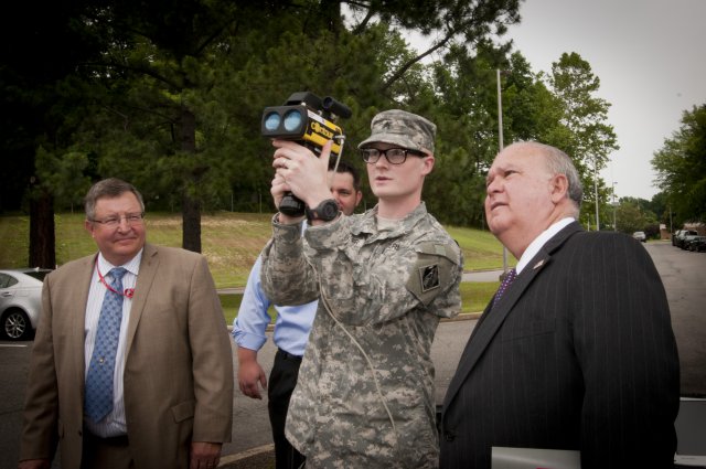 Cpl. Welker shows Under Secretary of the Army Joseph W. Westphal state-of-the-art technology at the U.S. Army Geospatial Center, May 30, 2012, in Alexandria, Va.  The Under Secretary of the Army visited the U.S. Army Geospatial Center to gain situational awareness and ensure the Army is correctly prioritizing, balancing and integrating resources to support the contributions of this mission-critical organization.