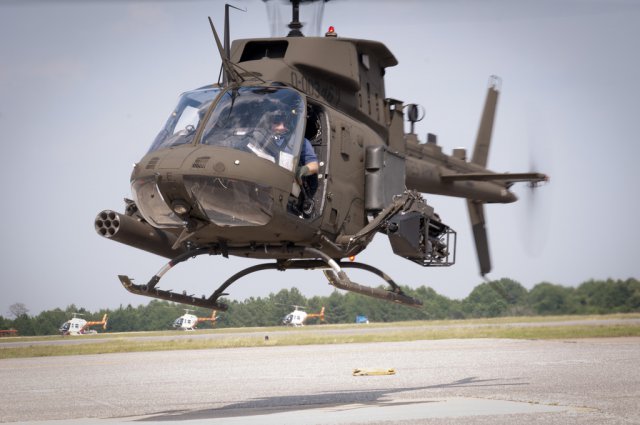 Under Secretary of the Army Joseph W. Westphal receives a flight demonstration in an OH-58D Kiowa Warrior helicopter at Cairnes Army Airfied, Fort Rucker, Ala.