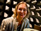 Photo of Elena Semouchkina testing a microwave dielectric cloak in an anechoic chamber.