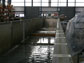 Photo of the Seawall experiment in the Large Wave Flume at Oregon State University.