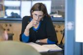 Woman reading textbook