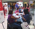 2009 Road Show - A woman gets her cholesterol and glucose levels checked at The Heart Truth Road Show in Atlanta.