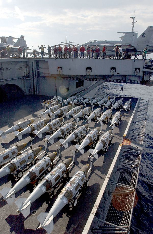 Photo: JDAMs loaded onto an aircraft elevator aboard USS Harry S. Truman