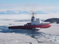 Photo of the Russian icebreaker Vladimir Ignatyuk breaking a path in sea ice in Antarctica.