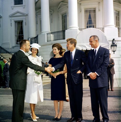 jfklibrary:

May 8, 1961 — President and Mrs. Kennedy, along with Vice President Johnson, greet Commander Alan B. Shepard, Jr. and his wife Louise prior to a presentation of the NASA Distinguished Service Medal to Commander Shepard. 
The JFK Library and Museum will be unveiling a new installation featuring Freedom 7, the iconic space capsule that Shepard piloted on the first manned American spaceflight, tomorrow at 10:00 AM. If you’re in the Boston area, join us! If you’re not, don’t despair — the capsule is scheduled to remain at the Museum through December 2015.
