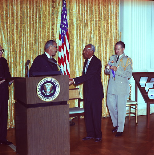 President Lyndon B. Johnson awards the Medal of Freedom to civil rights leader A. Philip Randolph.
L-R: President Lyndon B. Johnson, A. Philip Randolph, Gen. Chester Clifton.
-from the LBJ Library