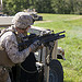 <p>A U.S. Marine assigned to the 26th Marine Expeditionary Unit (MEU) fires a round from a M203 grenade launcher during a mechanized assault training exercise at Fort Pickett, Va., Sept. 10, 2012. The Marines and Sailors who took part in the training used Humvees and Light Armored Vehicles to assault their final objective on the infantry platoon battle course. Their training was part of the 26th MEU’s pre-deployment training program. (DoD photo by Cpl. Christopher Q. Stone, U.S. Marine Corps/Released)</p>