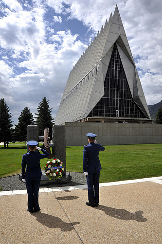 <p>U.S. Air Force Academy Cadet 1st Class Austin Nash, left, and Cadet 3rd Class Alexandra Lingle salute during a ceremony marking the anniversary of the Sept. 11, 2001, terrorist attacks on the United States at the Air Force Academy in Colorado Springs, Colo., Sept 11, 2012. Terrorists hijacked four passenger aircraft Sept. 11, 2001. Two of the aircraft were deliberately crashed into the World Trade Center in New York; one was crashed into the Pentagon; the fourth crashed near Shanksville, Pa. Nearly 3,000 people died in the attacks. (DoD photo by Raymond McCoy, U.S. Air Force/Released)</p>