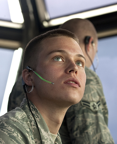 <p>U.S. Air Force Airman 1st Class Patrick Skogen, an air traffic controller assigned to the 57th Operations Support Squadron, reads data on a screen to determine locations of aircraft at the control tower at Nellis Air Force Base, Nev., Aug. 31, 2012. (DoD photo by Staff Sgt. Christopher Hubenthal, U.S. Air Force/Released)</p>