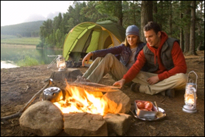 A man and a woman camping