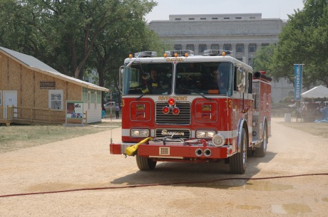 Washington, D.C., June 28, 2005 -- First responders (firemen) on a call at the National Mall. 