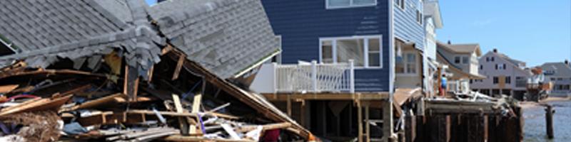 August 27th, 2011. Along the shoreline, a once-blue home has resulted in a pile of debris after Tropical Storm Irene hit. 