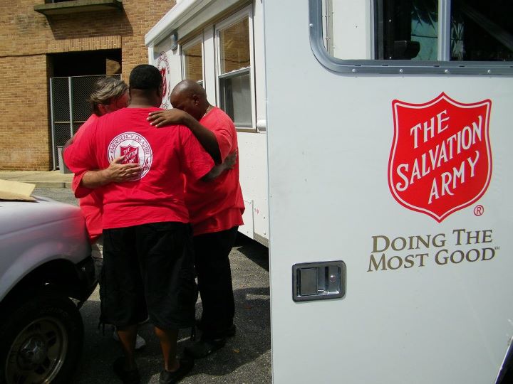 volunteers pray