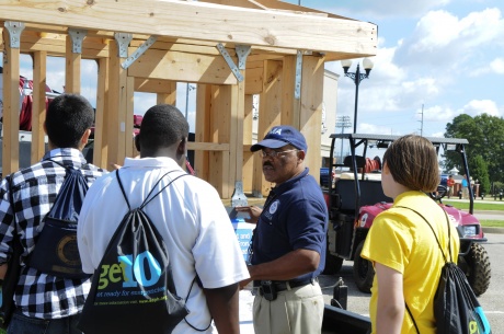 FEMA Mitigation Specialist speaks to local students about wind-resistant techniques of building during Be Ready Alabama. In remembrance of Sept. 11, 2001, Be Ready Alabama, hosted by Troy University and sponsored by the EMA, emphasized teaching students about safety in a number of area, including tornado preparedness. 