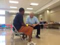 Deputy Administrator speaks with Hurricane Isaac Survivor