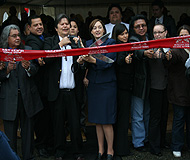 Housing Authority staff cutting ribbon at grand opening.