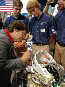 Acting Secretary Blank signs her name next to Secretary Chu's on a robot designed by a high school team from Knoxville, TN that was built via additive manufacturing (3-D printing). 