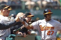 Orioles beat Oakland, 9-5, to remain one game behind Yankees in AL East race