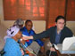 Photo of linguist Johanna Brugman of Cornell, right, with Ouma Katrina Esau and Willem Damarah.