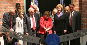 Acting Secretary Rebecca Blank cuts the steel ribbon, officially opening the Elijah J. McCoy USPTO Satellite Office