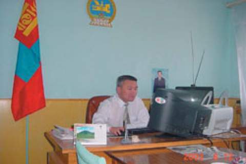 Chief Judge of the Dornod Aimag court at his office working on this computer through a local area network.