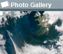 Satellite image of the North Atlantic showing algal blooms, the photo gallery icon, and the words Photo Gallery.