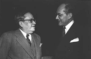 Raphael Lemkin (right) with Ambassador Amado of Brazil (left) before a plenary session of the General Assembly at which the Convention on the Prevention and Punishment of Genocide was approved. Palais de Chaillot, Paris, December 11, 1948.