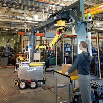 NIST’s new Autonomous Assembly Testbed includes an automated guided vehicle (left), conveyers, mannequins and an underslung robot arm (right). 
