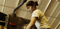 Soldier working on a piece of machinery