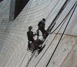 photo: highscaling crew repairing concrete on face of Glen Canyon Dam