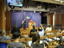 Acting Assistant Attorney General Sharis Pozen takes questions from the media after the announcement is made.