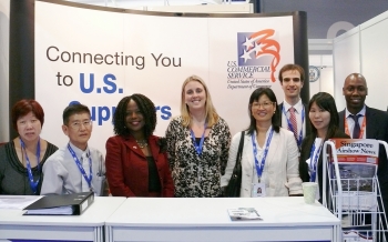 Assistant Secretary Nicole Y Lamb-Hale (third from left) with the staff of the U.S. International Pavilion at the 2012 Singapore Air Show. 