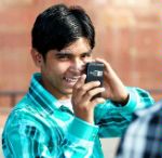Date: 02/06/2012 Description: Boy with cell phone. © AP Image