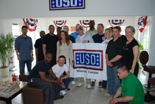 Miss America 2009, Katie Stam, stands with troops at the Wounded Warrior USO in Landstuhl during her visit to Germany.