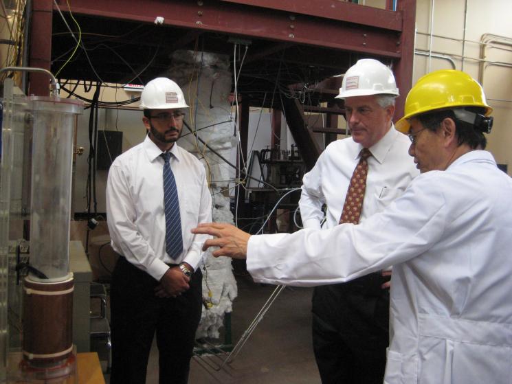 Ohio State University (OSU) Professor Liang-Shih Fan shows Assistant Secretary for Fossil Energy Charles McConnell OSU's coal direct chemical looping reactor. | Photo by Niranjani Deshpande