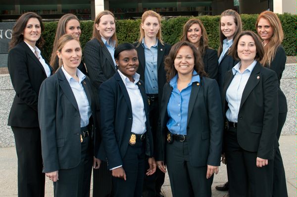 November 23, 2010:  Eleven of the twelve female special agents serving on Diplomatic Security's protective detail for U.S. Secretary of State Hillary Rodham Clinton appear outside the diplomatic entrance to the U.S. Department of State in Washington, D.C. This is the largest group of women ever to serve on the DS security detail for a U.S. Secretary of State.  (Source: U.S. Department of State)