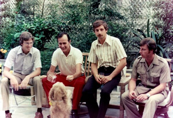 July 29, 1975: Chief of Mission (and future President ) George H.W. Bush, head of the U.S. Liaison Office in Beijing, China (seated second from left) attends the farewell party for SY Special Agents Peter Bergin (seated left, a future Director of the Diplomatic Security Service) and Michael Woods (seated second from right) in the garden of the Liaison Office compound. (Private Collection)