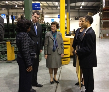 Photo: Veronica Artis, Executive Vice President, Genesee Packaging; Flint Mayor Dayne Walling; Dr. Blank; Jane Worthing, Chief Operating Officer, Genesee Packaging, Terence Broussard, Operations/Sales Manager, Genesee Packaging