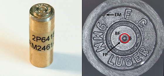 Figure 2. On the left, a NIST SRM 2461 Cartridge Case mounted on a brass cylinder holder; right, optical micrograph showing the three certified areas of the SRM, breech face impression (BF), firing pin impression (FP), and ejector mark (EM).