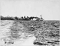 Wadsworth (DD60). Starboard bow, laying a smoke screen