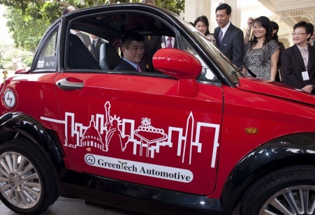 Secretary Locke in a GreenTech electric car.