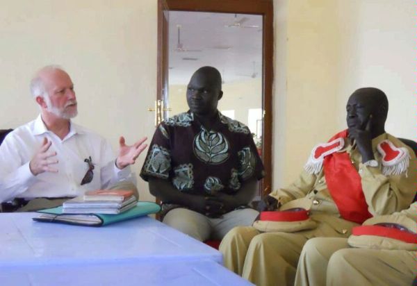 Members of the Council of Traditional Authority Leaders in Warrap State, Southern Sudan explain to Amb. Loftis, the Acting Coordinator for Reconstruction and Stabilization, how traditional justice works with the formal justice system to settle cases and promote rule of law. (DOS photo, 4/8/11) 