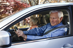 Photo: older adult couple in a car
