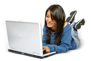 ASVAB Tutorial. Image of teenage student interacting with her laptop.