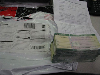 Stack of Counterfeit Postal Service Money Orders Seized