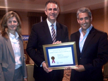 Under Secretary Francisco Sanchez and Chicago U.S. Export Assistance Center Director Julie Carducci present Export Achievement Certificate to BayRu CEO Aaron Block. (Photo Commerce)