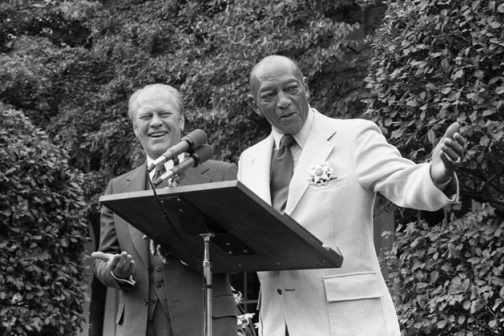 Olympic champion Jesse Owens speaking in the East Garden at the White House