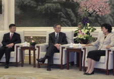 Pictured seated are Locke, Energy Secretary Steven Chu and State Councilor Liu Yangdong at the Great Hall of the People. Click for larger picture.