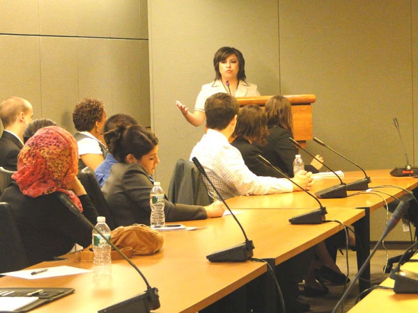 Ms. van der Horst responds to questions from an audience of approximately 40 college students.