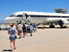 Student Airborne Research Program participants prepare to board NASA's DC-8 flying laboratory at the NASA Dryden Aircraft Operations Facility in Palmdale, Calif., June 24 to check out their instrument work stations for the coming science flights.